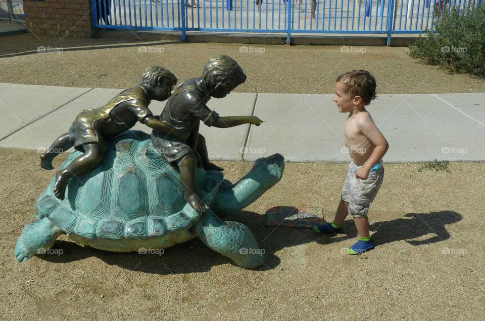 Children and turtle