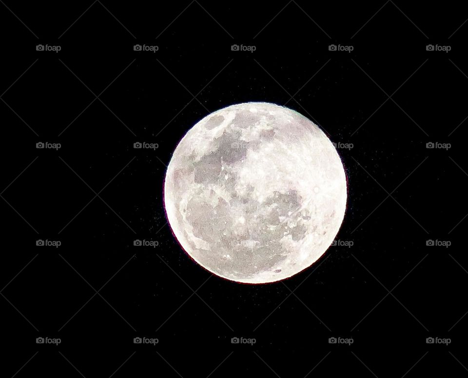 Beautiful full moon and its visible texture of the surface