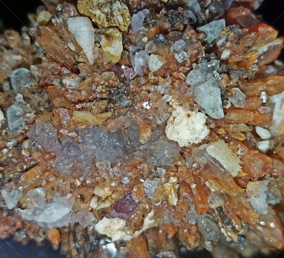 Crystal: Creedite from Colorado Mines 
Very colorful, changes color depending on the season