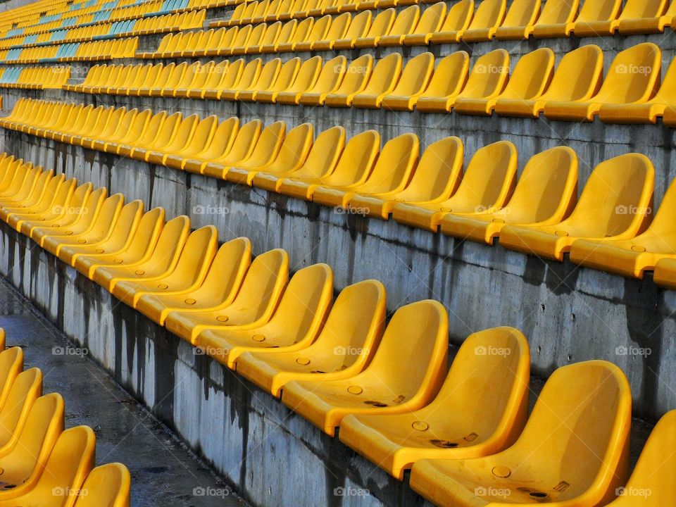 yellow seats in the stadium