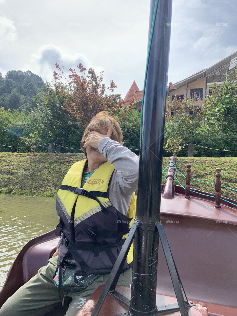 Woman on the boat  with fear 