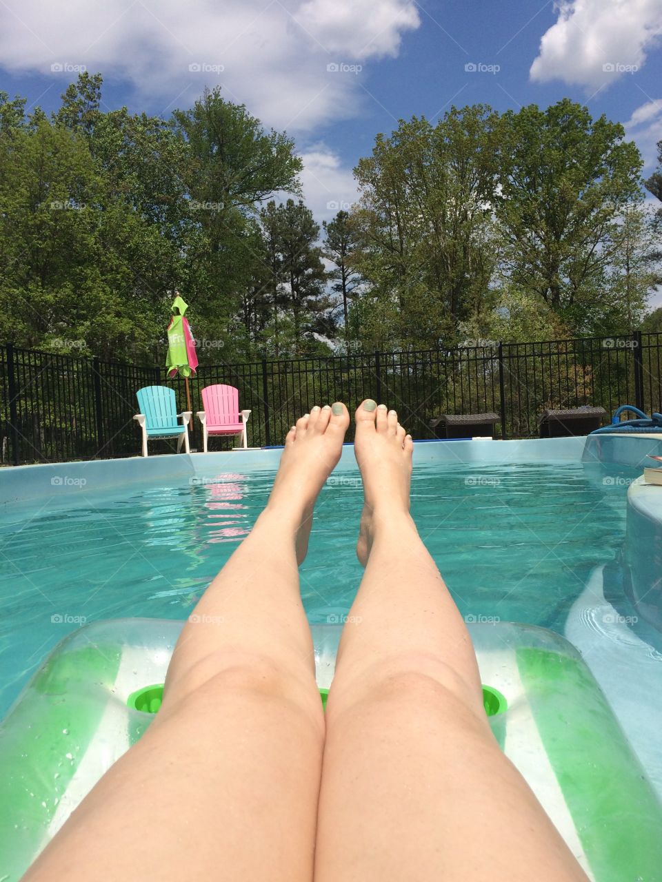 Feet up in the pool