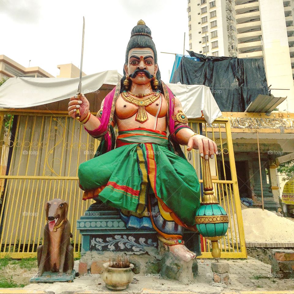 Indian God looking after folks in Penang, Malaysia. I wish for world peace. 