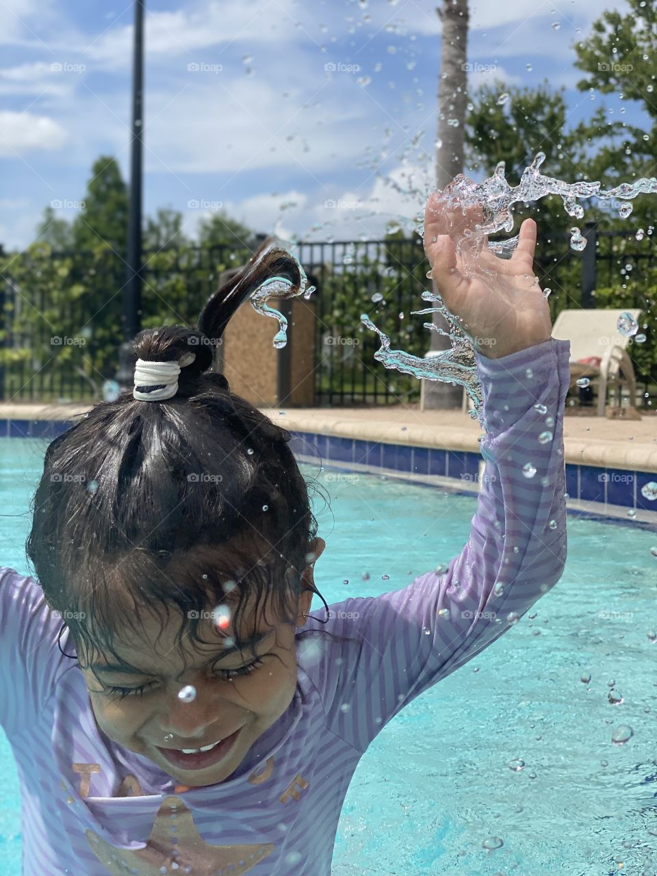 How the water collects around her hair and hands. Ha