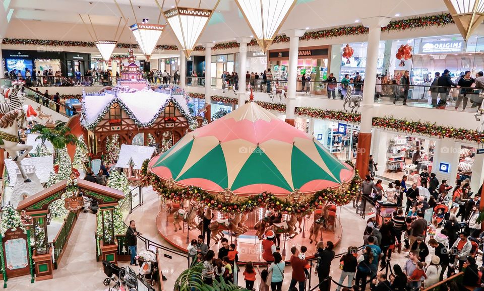 Many people at the shopping mall during Christmas holidays 