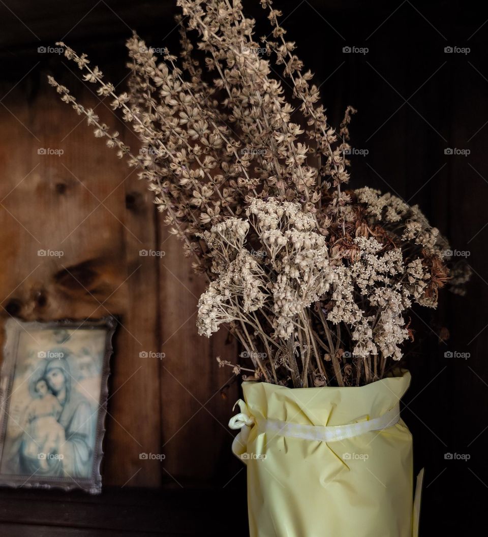 Dry flowers and an icon