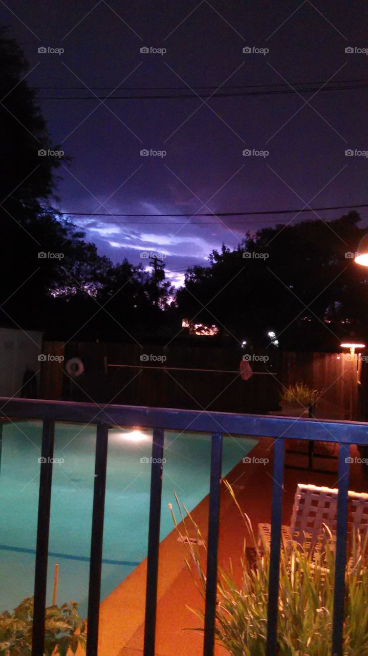 Calm before the storm. Out by my pool as a storm rose in