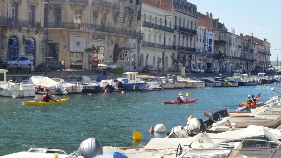canoeing people on the canal of Sete in France