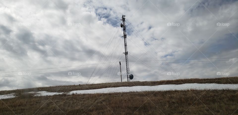 A lonesome satellite tower on a cold day. 