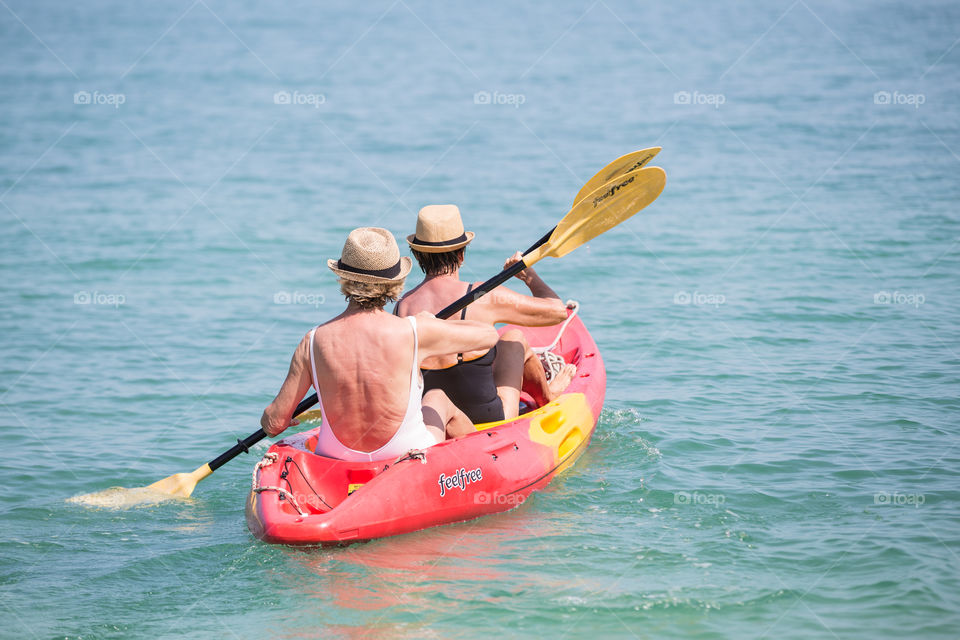 Tourist sailing Kayak in the sea