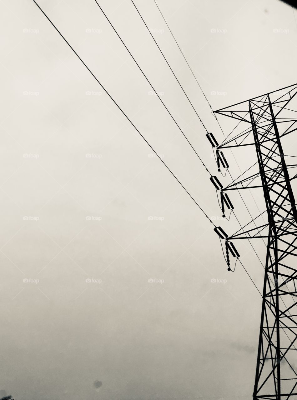 Iron giants and power lines in black and white 