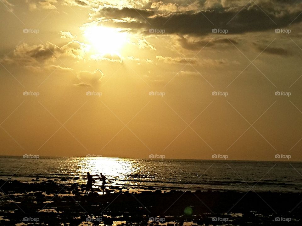 couples and sunset. golden sunset on Gili Trawangan