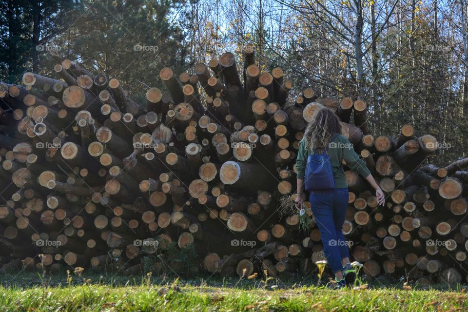 woman walking wooden background