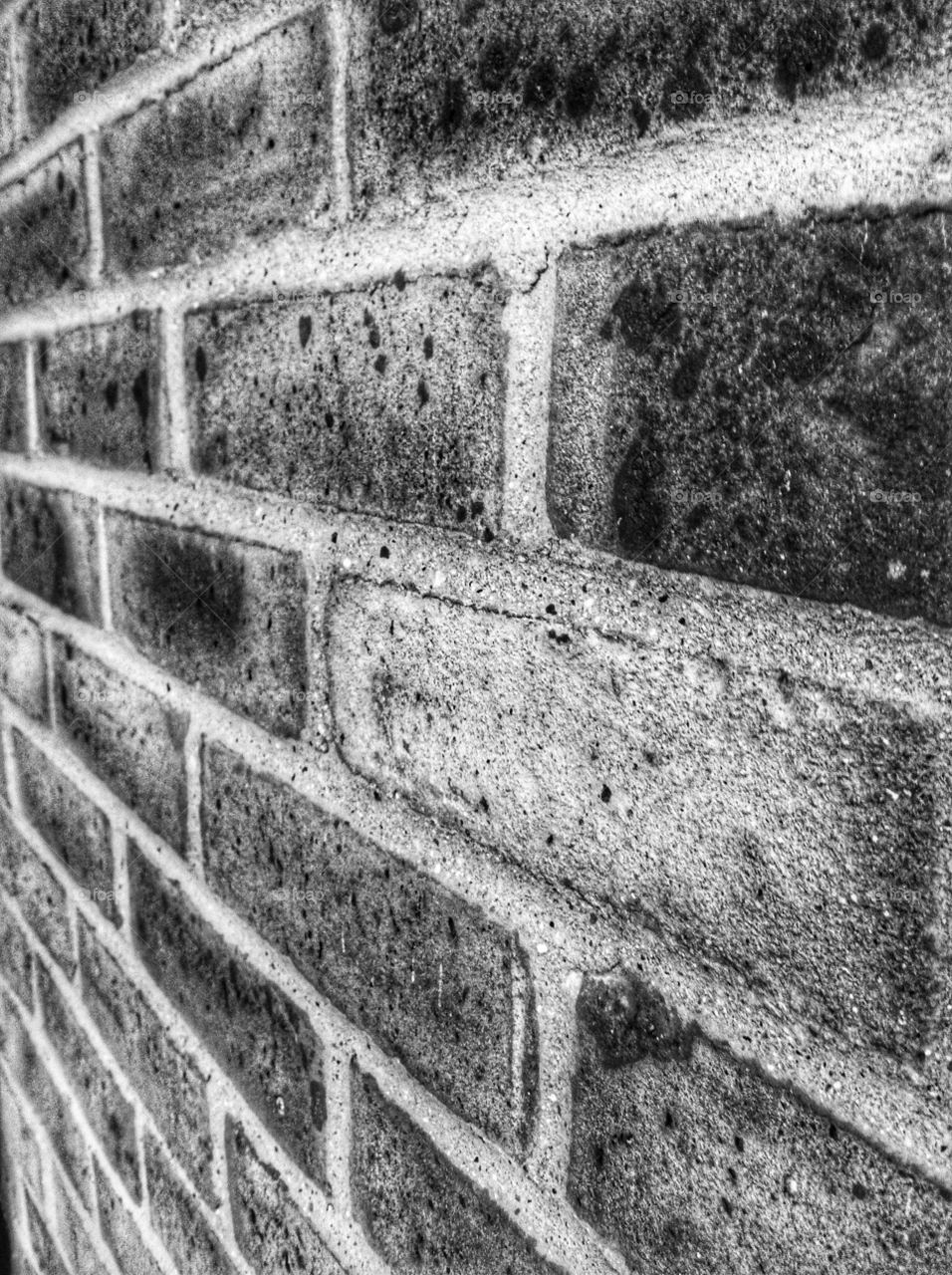 Close up of brickwork in black and white.