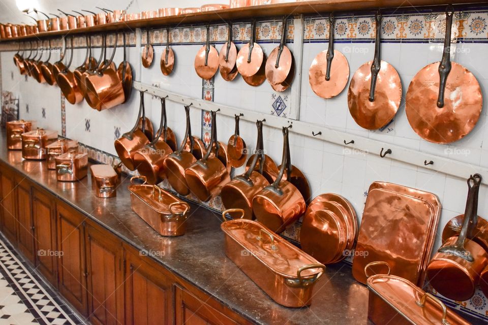 Pots and pans in a kitchen of an old farmhouse