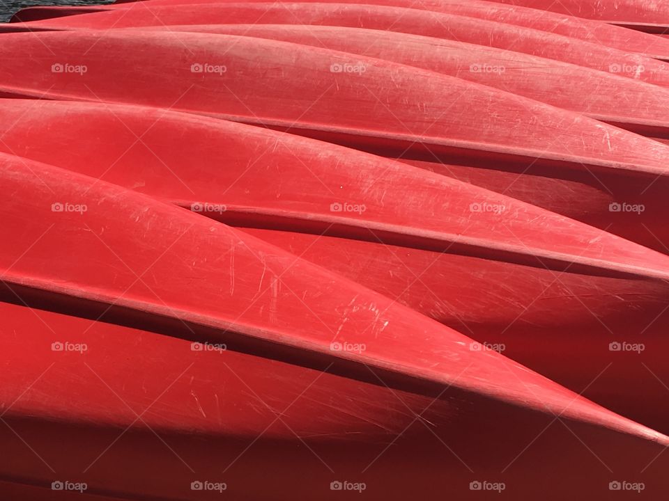 Red Kayaks on a dock 