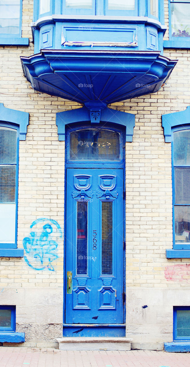 Narrow blue door 