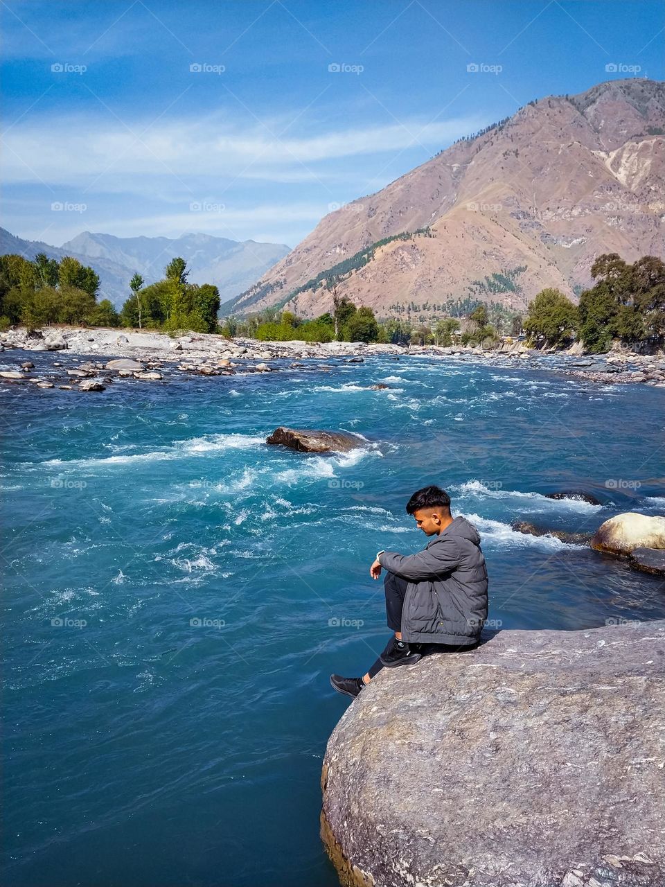 amazing lake and a man behind it.