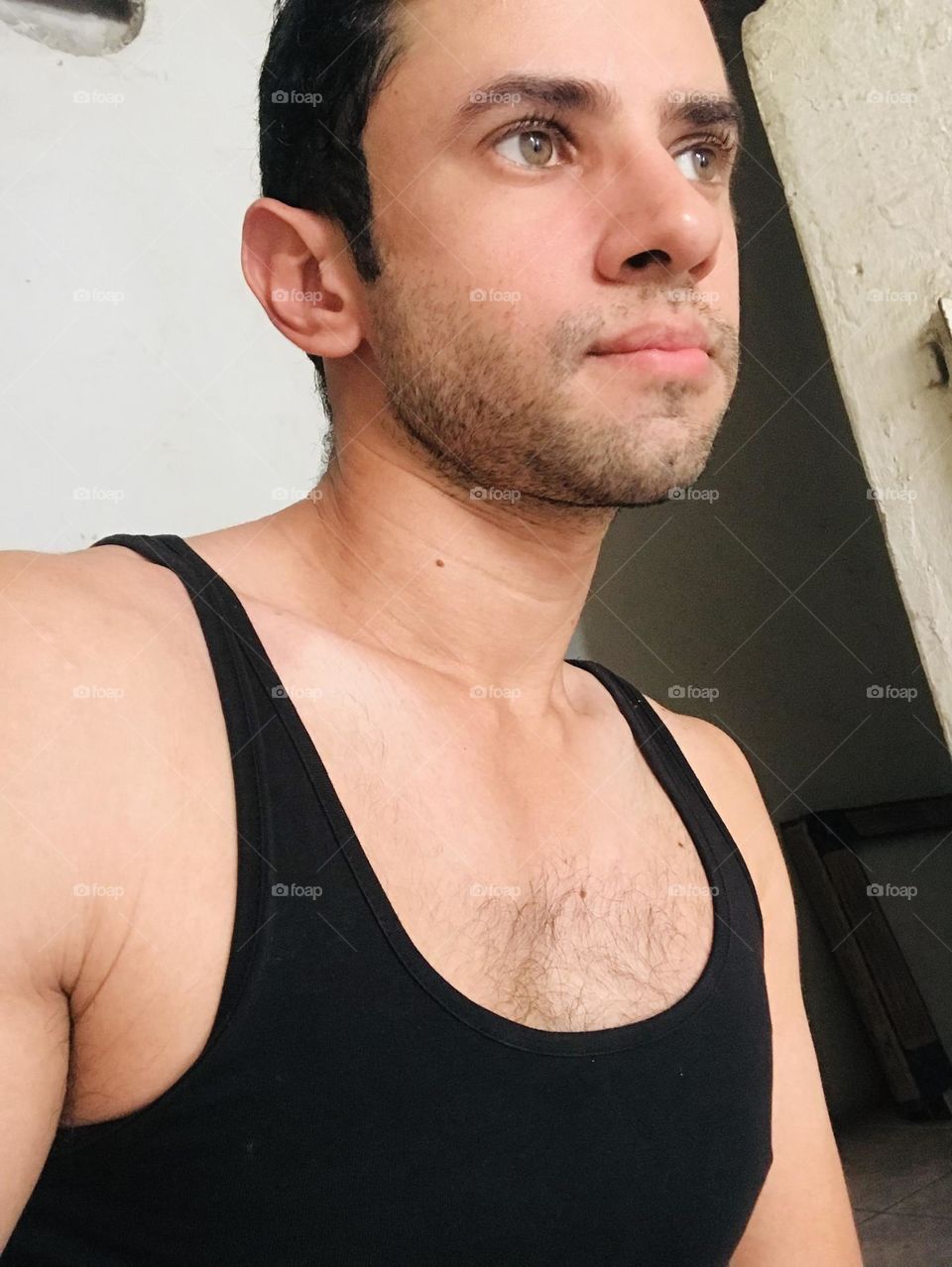 strong man chest with black t-shirt