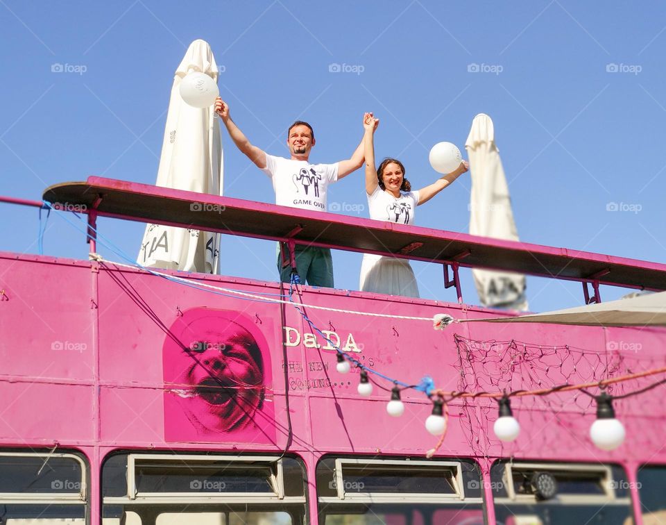 Barbie and Ken on a bus