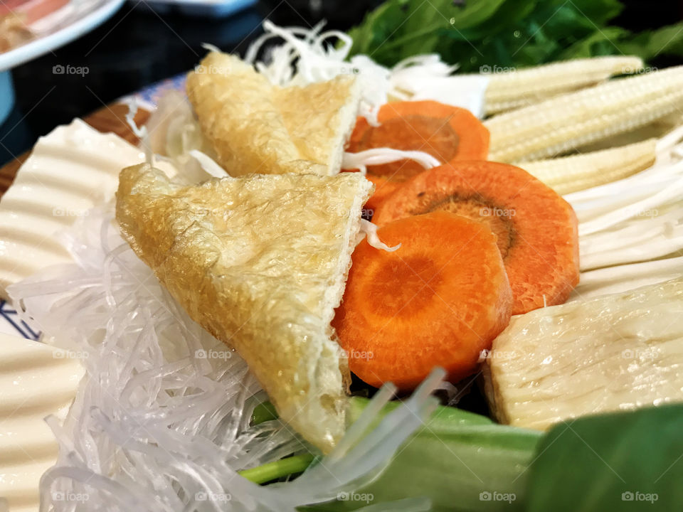 Fresh mixes vegetable, tofu and grass noodle for hot pot with Sukiyaki sauce.
Super yummy.