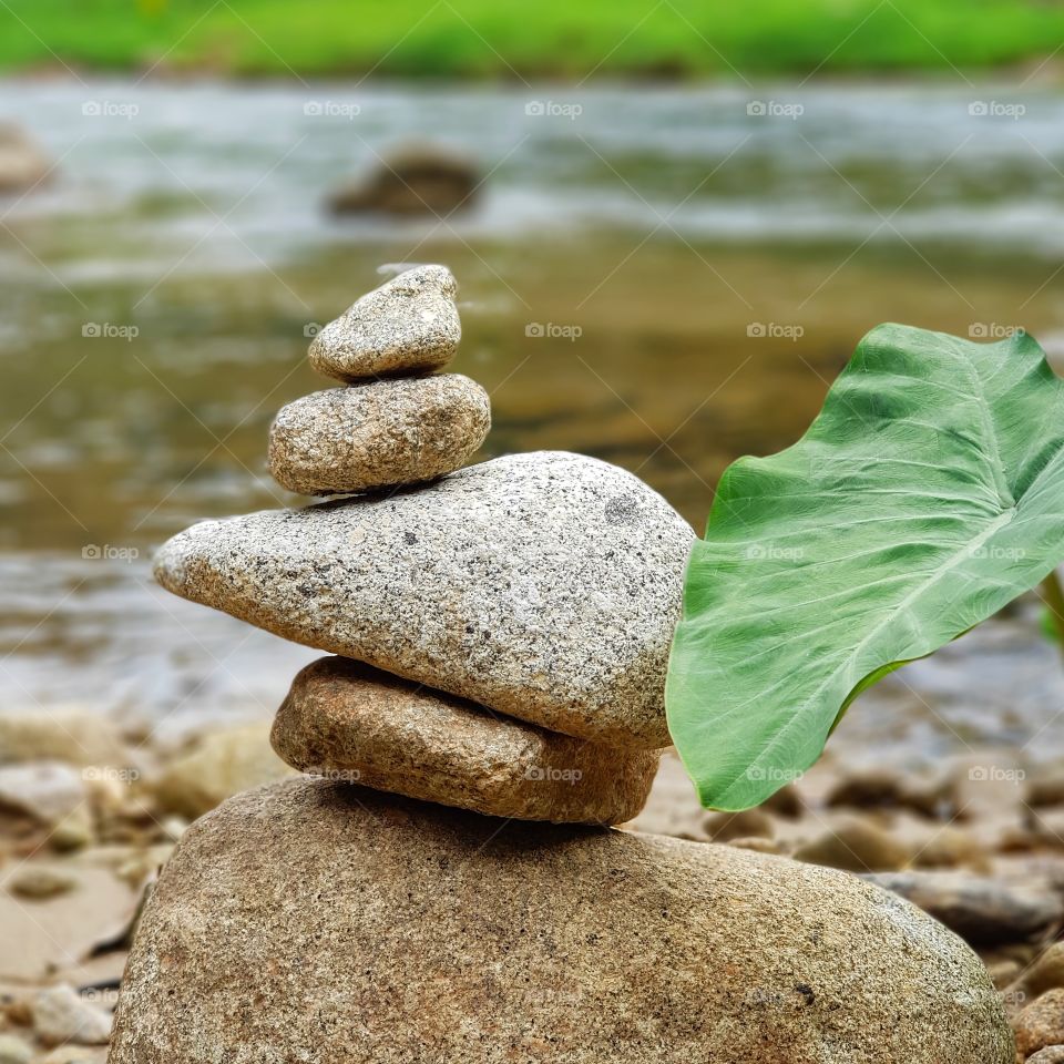 Natural spa with the stone and stream