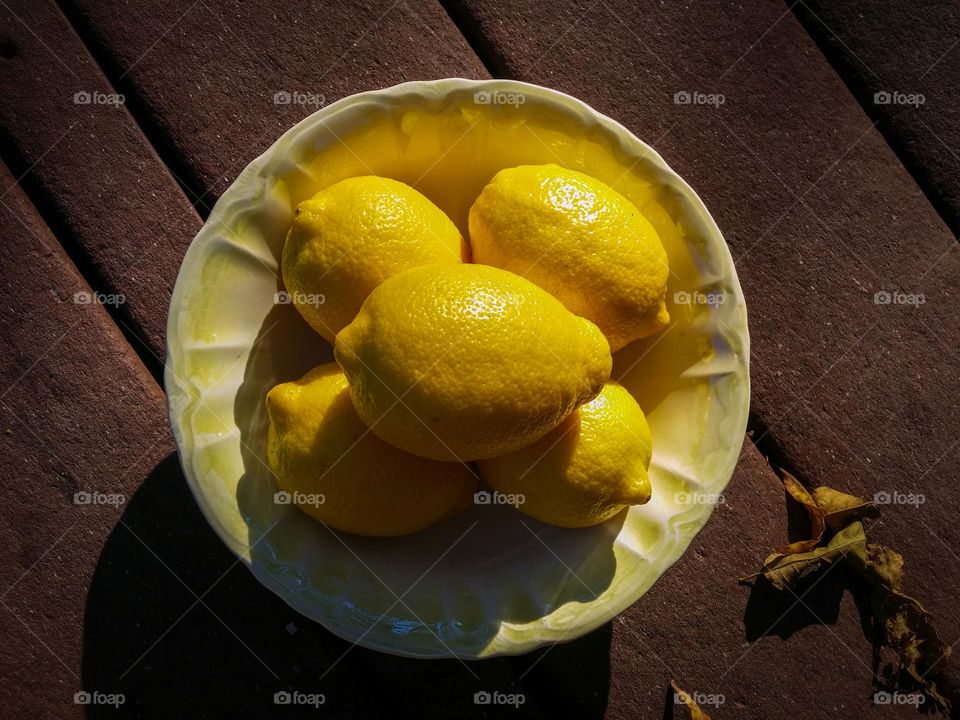 Yellow Lemons in a Bowl