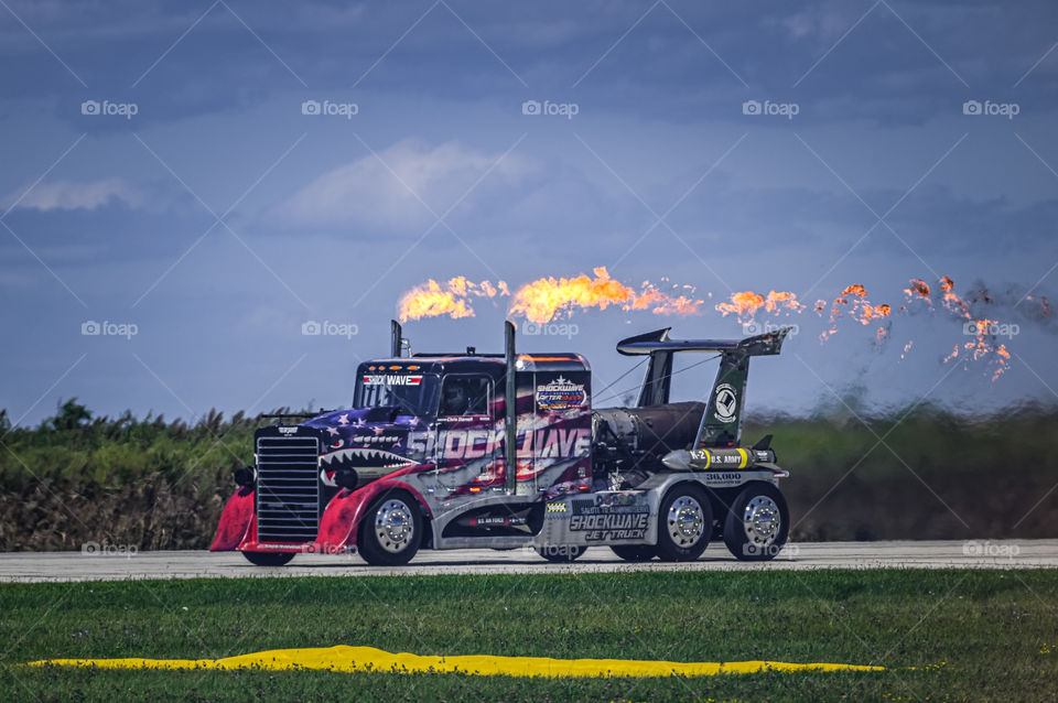 Shockwave Jet Truck racing down the runway 