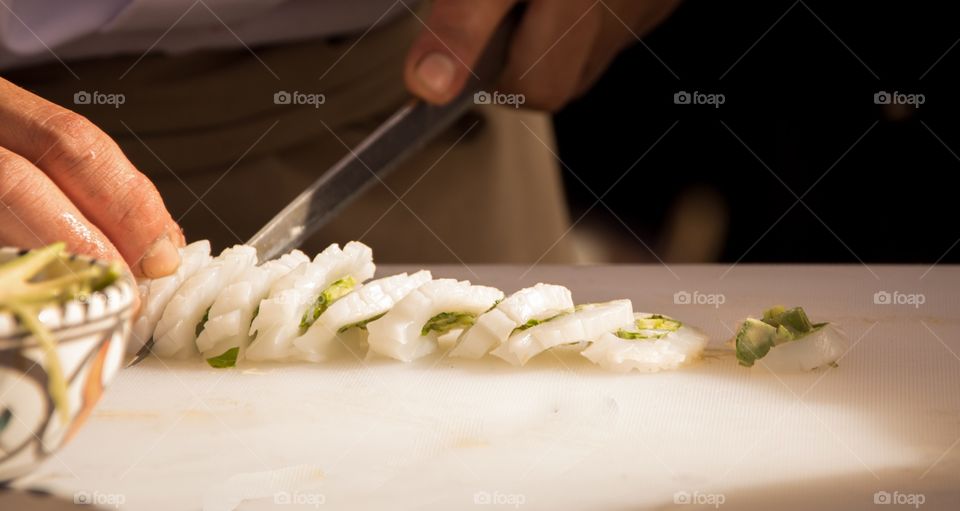 Panoramic view of person preparing sushi food
