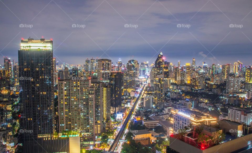 the Cityscape and the skyscrapers of the Metropolis Bangkok Thailand Southeast Asia in the Night Time