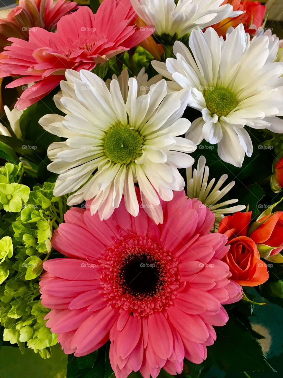 A colorful bouquet on a snowy white day