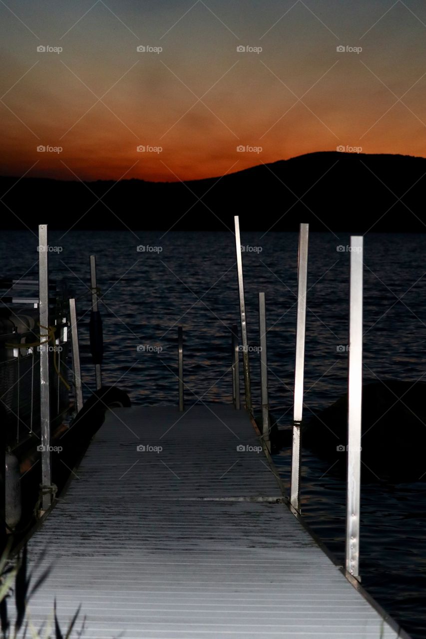 Lake dock at sunset