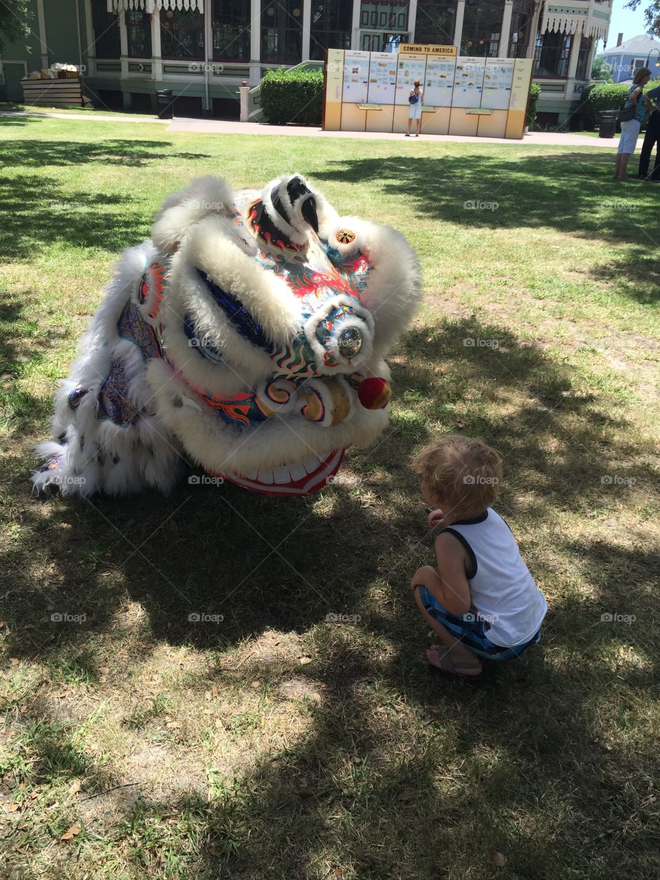 My nephew was fascinated by the Chinese Lions at the Galveston Heritage Festival  
