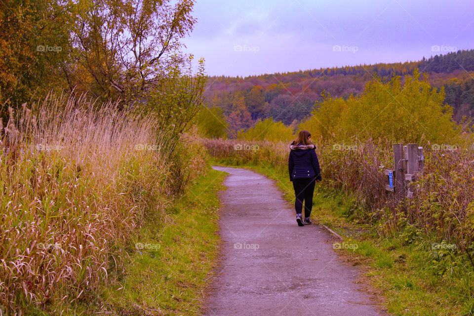 Girl walking looking at scenery