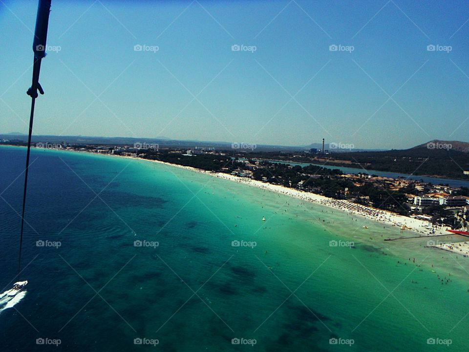 pov on maiorca beach by parasailing