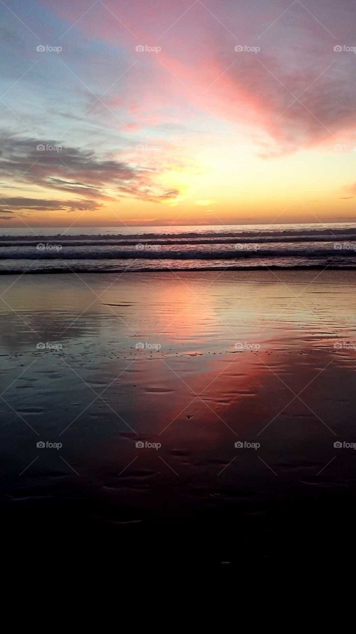 Beautiful sunset reflection on the beach