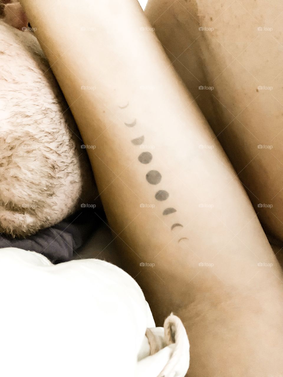 A tattoo of the moon cycle can represent the circle of life, rebirth, and even immortality. These phases are symbolized with the waxing, waning and full moon