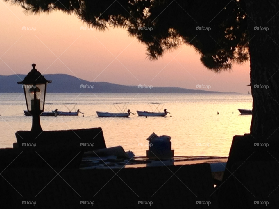 sunset boats sea fishing by cabday