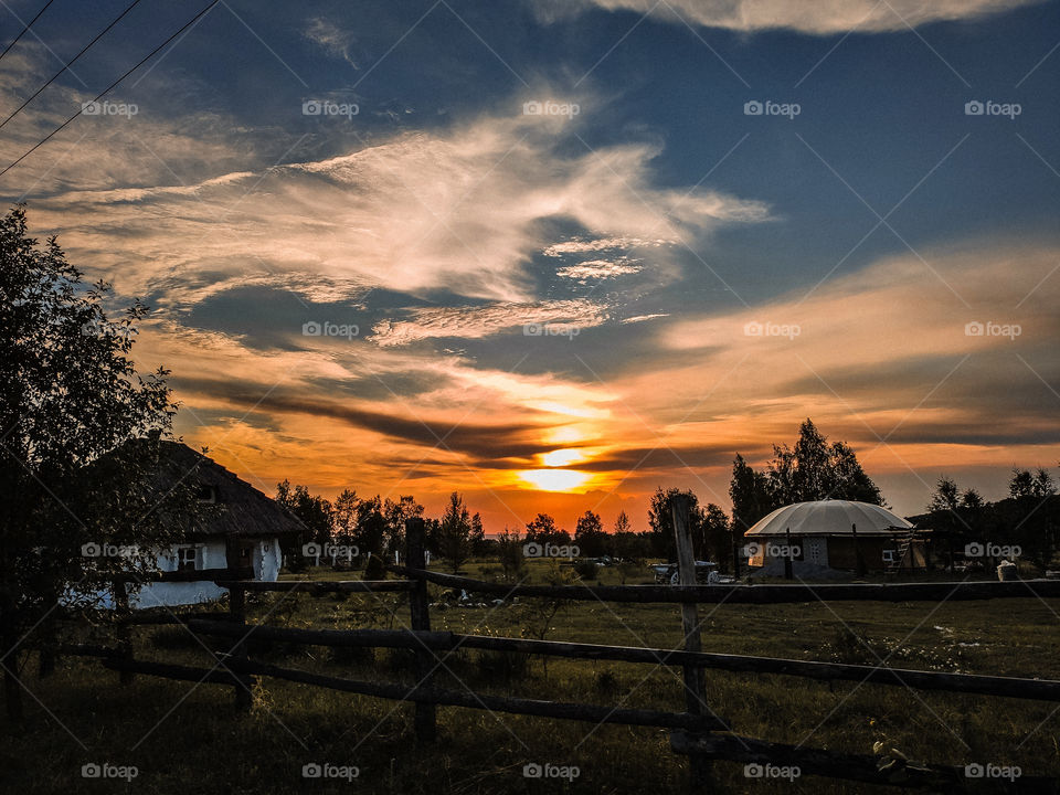 Russian village at sunset