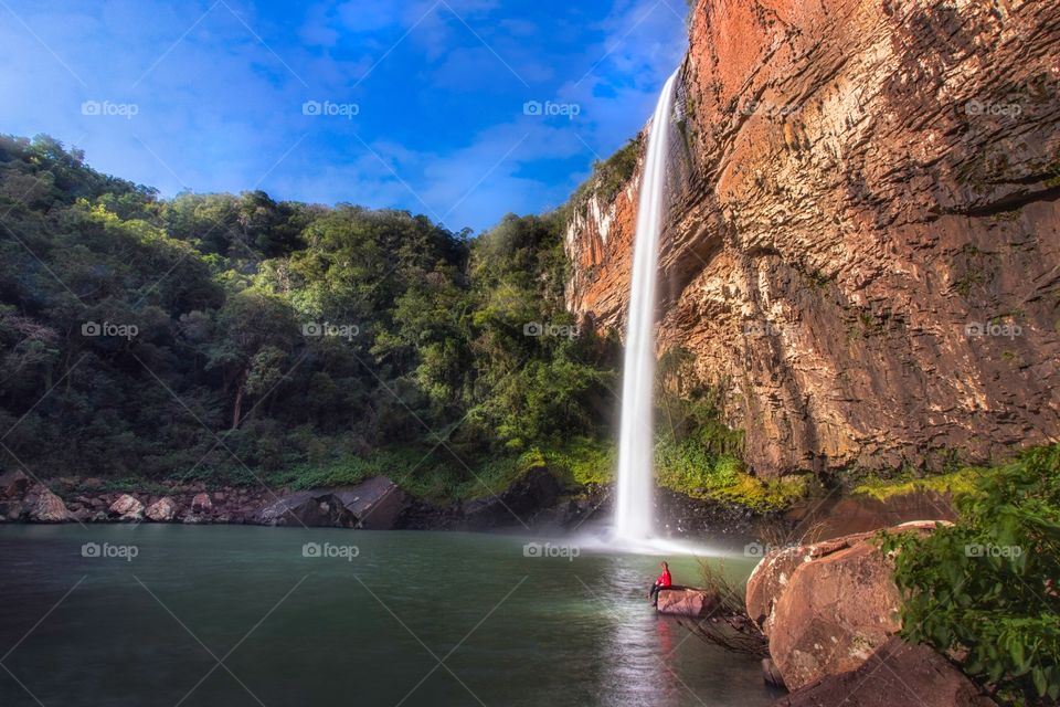 Enjoying the waterfall