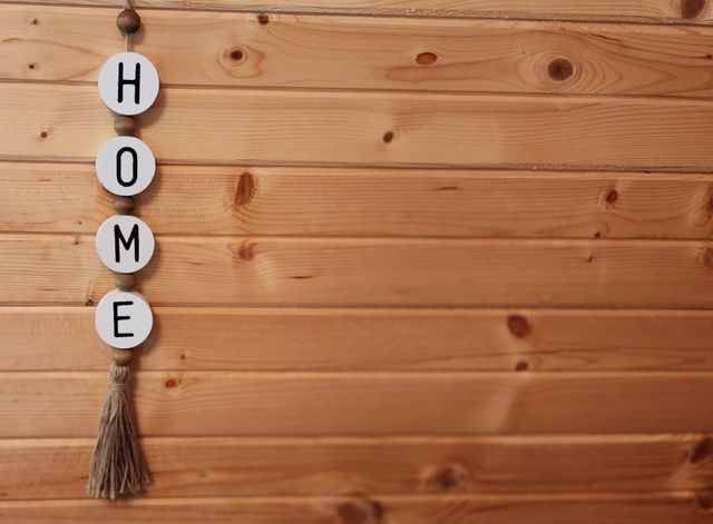 Home sign on wall (side)