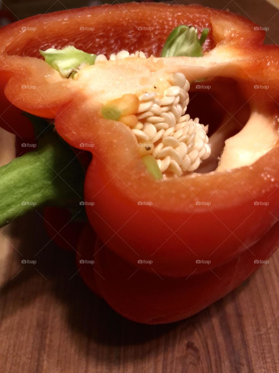 Closeup of red pepper sliced to see its seeds. Love to use all color peppers in most of my cooking!