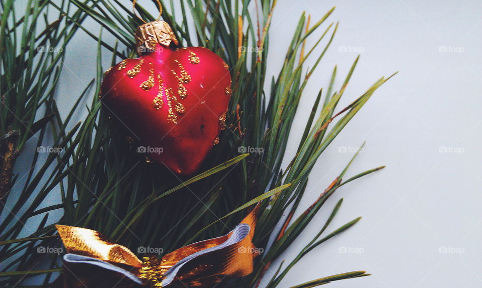 Christmas toys and a branch of pine