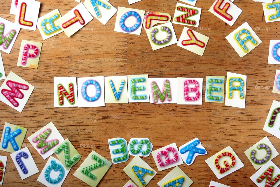 the word november. the word november spelled in colorful letters