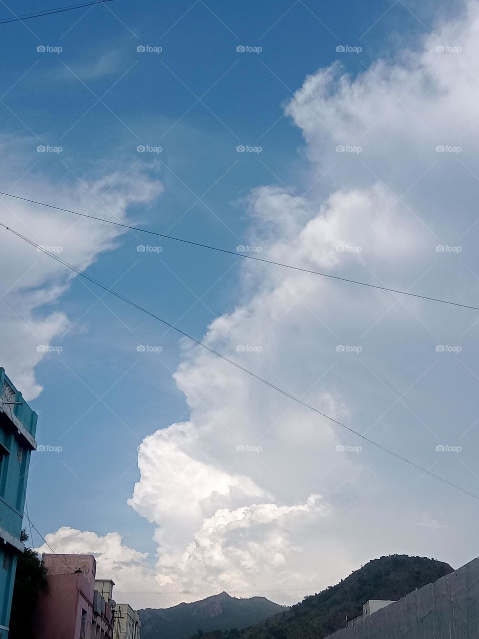 *Ravarma*  Blue & White, amazing clouds,