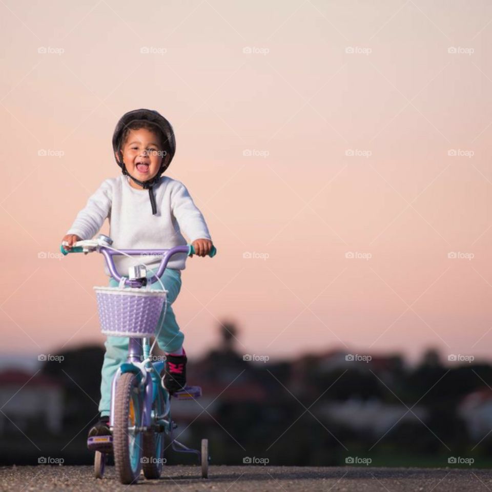 happy cycle rides child