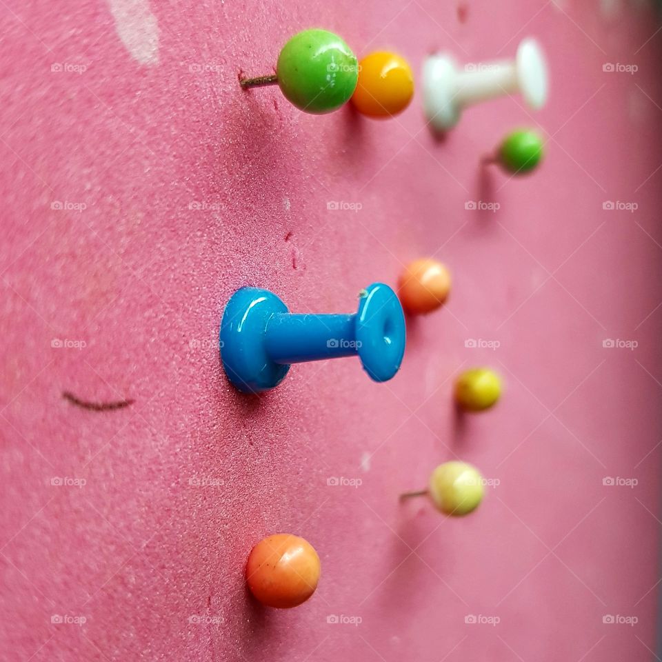 The colorful push boards on the old board