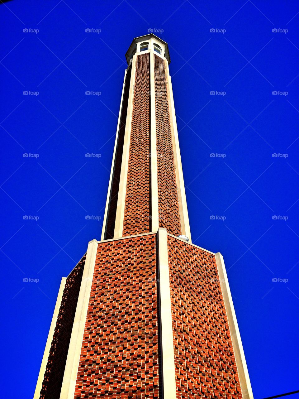 Tall structure against blue sky