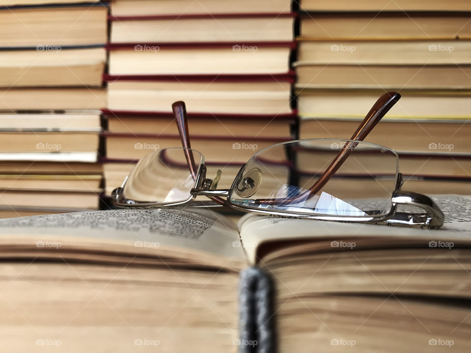 Glasses on opened book 