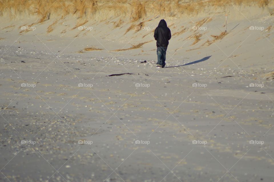 Lonely walk on beach